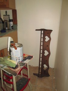 The shelf in the corner where EJ painted.