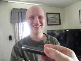 JJ listening to friends singing "Happy Birthday"