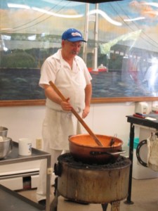 The Owner of the Fort Fudge Shop making fudge.