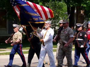 Veterans walking to the cemetery on Memorial Day 2012